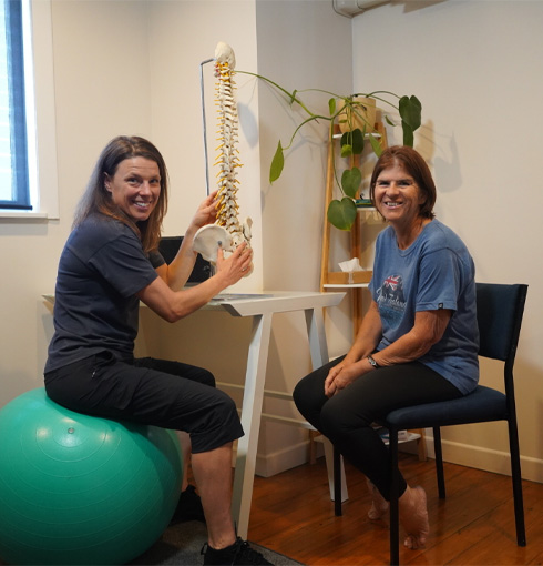 Jane explaining the osteopathic process to a client